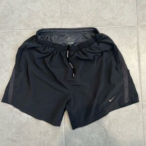 Nike DriFit Running Shorts. Front and rear pocket.